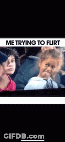 A Little Girl Is Making A Face While Sitting In A Car With Other People . GIF