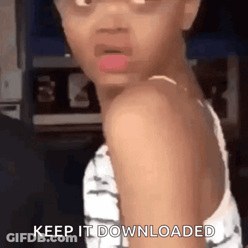 A Little Girl Is Making A Funny Face And Saying `` Keep It Downloaded '' While Looking Over Her Shoulder . GIF