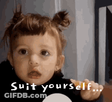A Little Girl Is Making A Funny Face And Saying Suit Yourself GIF
