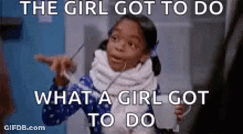 A Little Girl Is Making A Funny Face While Holding A Cup Of Milk . GIF