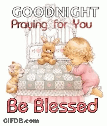 A Little Girl Is Praying In Front Of A Bed With A Bunny And A Kitten . GIF