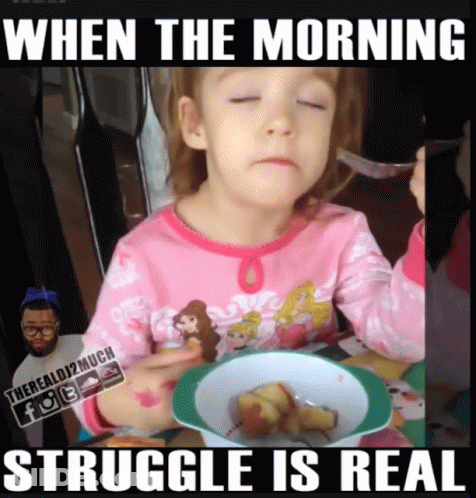 A Little Girl Is Sitting At A Table With A Plate Of Food And A Caption That Says " When The Morning Struggle Is Real " GIF