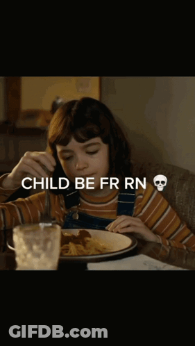 A Little Girl Is Sitting At A Table With A Plate Of Food And The Words Child Be Fr Rn GIF