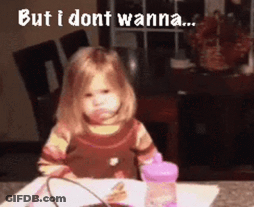 A Little Girl Is Sitting At A Table With The Words But I Dont Wanna Written Above Her GIF