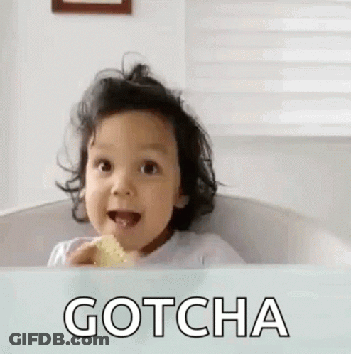 A Little Girl Is Sitting In A Bathtub Eating A Lemon And Making A Funny Face . GIF