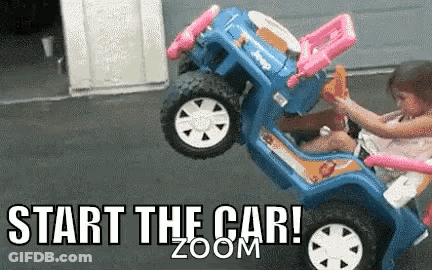 A Little Girl Is Sitting In A Blue Toy Car With The Words Start The Car Zoom Written On The Bottom . GIF