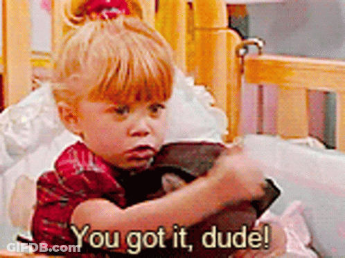 A Little Girl Is Sitting In A Crib And Saying You Got It Dude ! GIF