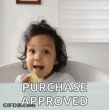 A Little Girl Is Sitting In A High Chair Eating A Snack And Says `` Purchase Approved '' . GIF