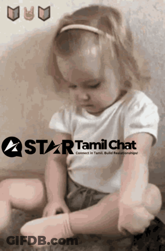 A Little Girl Is Sitting In Front Of A Star Tamil Chat Sign GIF