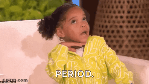 A Little Girl Is Sitting On A Couch And Making A Funny Face And Saying Period . GIF