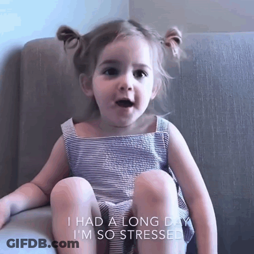 A Little Girl Is Sitting On A Couch With The Words I Had A Long Day I 'M So Stressed GIF
