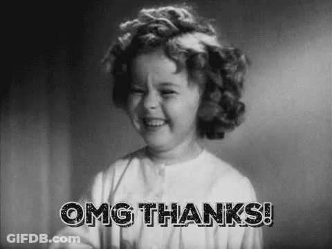 A Little Girl Is Smiling In A Black And White Photo And Saying `` Omg Thanks '' . GIF