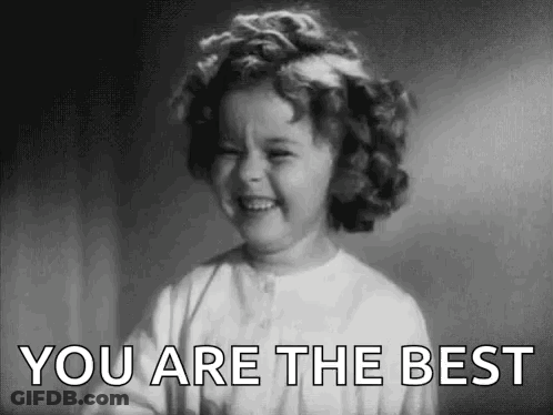 A Little Girl Is Smiling In A Black And White Photo And Saying `` You Are The Best '' . GIF