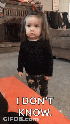 A Little Girl Is Standing In A Living Room And Saying `` I Do N't Know . '' GIF
