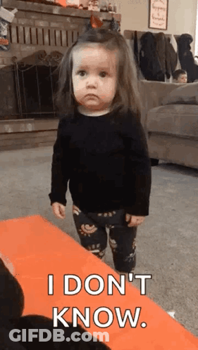 A Little Girl Is Standing In A Living Room And Saying `` I Don 'T Know . '' GIF