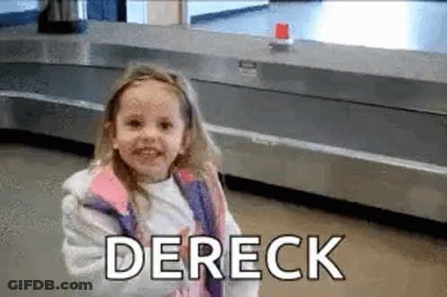 A Little Girl Is Standing In Front Of A Conveyor Belt At An Airport And Smiling . GIF