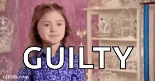 A Little Girl Is Standing In Front Of A Shelf With The Word Guilty Written In Front Of Her . GIF