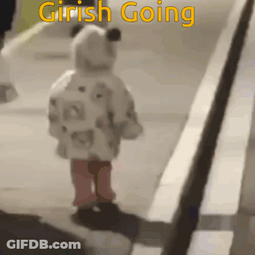 A Little Girl Is Walking Down A Sidewalk With The Words " Girish Going " On The Bottom GIF