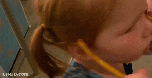 A Little Girl Is Wearing A Blue Dress And Holding A Yellow Pencil . GIF