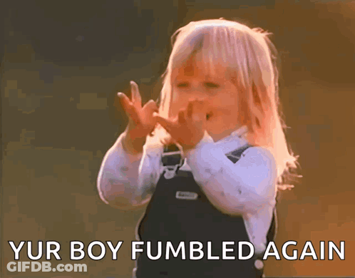 A Little Girl Making A Funny Face With The Words " Yur Boy Fumbled Again " Behind Her GIF