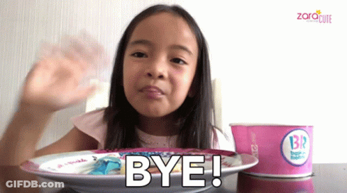 A Little Girl Sitting At A Table With A Plate Of Food And A Cup Of Ice Cream That Says Br On It GIF