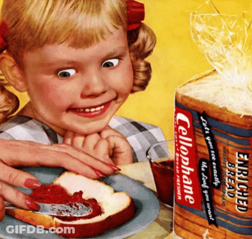 A Little Girl Spreading Jam On A Slice Of Bread Next To A Bag Of Celophane GIF