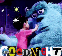 A Little Girl Standing Next To A Stuffed Animal That Says " Goodnight " GIF