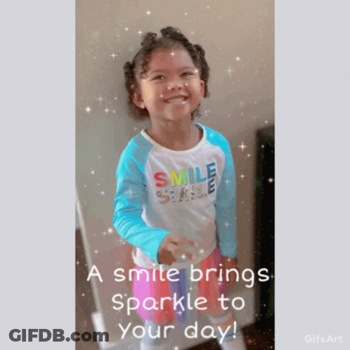 A Little Girl Wearing A Blue And White Smile Shirt GIF