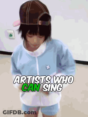 A Little Girl Wearing A Hat And A Blue Jacket With The Words Artists Who Can Sing Above Her GIF