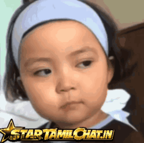 A Little Girl Wearing A Headband With A Star That Says Startamlchat.in On It GIF