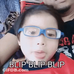 A Little Girl Wearing Glasses With The Words Blip Blip Blip Written Below Her GIF