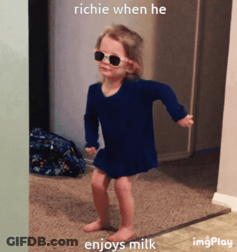 A Little Girl Wearing Sunglasses And A Blue Dress Dancing With The Caption Richie When He Enjoys Milk GIF
