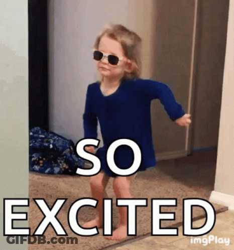 A Little Girl Wearing Sunglasses And A Blue Shirt Is Excited GIF