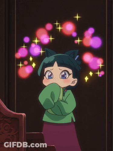 Girl With Cat Ears Surrounded By Glowing Lights GIF