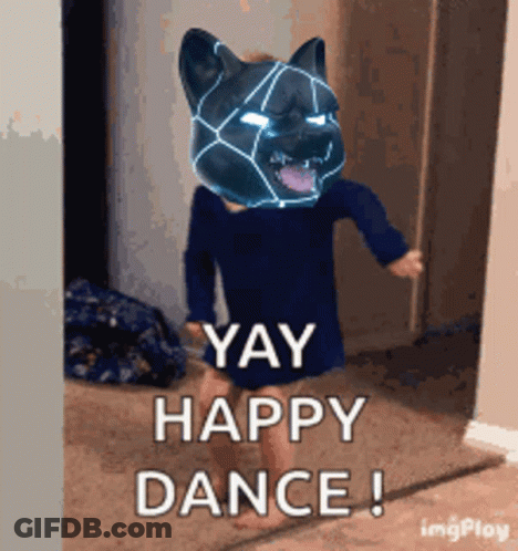 A Little Girl With A Cat Mask On Her Head Says Yay Happy Dance ! GIF