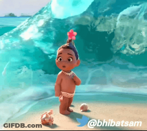 A Little Girl With A Flower In Her Hair Is On The Beach GIF