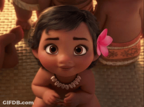 A Little Girl With A Flower In Her Hair Is Wearing A Necklace That Says ' 00000 ' On It GIF
