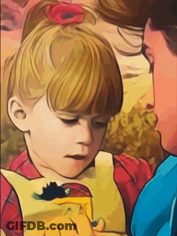 A Little Girl With A Red Flower In Her Hair Is Looking Down At Something GIF