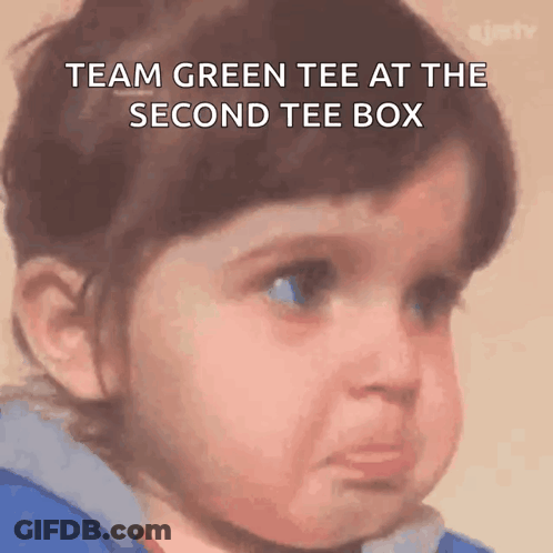 A Little Girl With A Sad Look On Her Face With The Words Team Green Tee At The Second Tee Box GIF