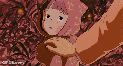 A Little Girl With A Scarf On Her Head Has The Letter A On It GIF