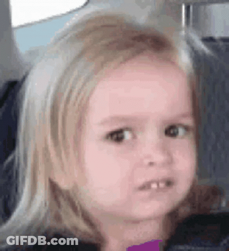 Little Girl Sitting In Car Seat Making Funny Face GIF