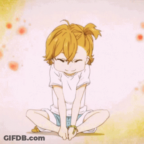 A Little Girl With Blonde Hair Is Sitting In A Lotus Position With Her Legs Crossed GIF