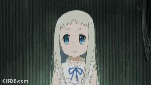 A Little Girl With Long White Hair And A Blue Bow On Her Shirt Is Smiling . GIF