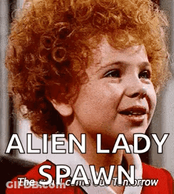 A Little Girl With Red Curly Hair Is Smiling And Says Alien Lady Spawn . GIF