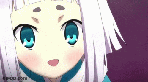A Little Girl With White Hair And Blue Eyes Looks At The Camera GIF