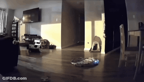 A Living Room With A Couch And A Television GIF