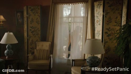 A Living Room With Chairs And Lamps And The Words #Readysetpanic On The Bottom GIF
