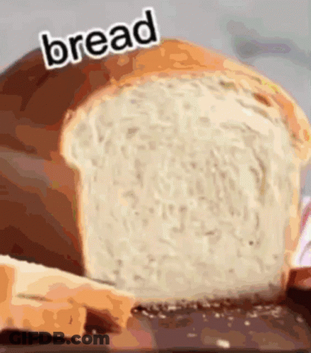 A Loaf Of Bread With The Word Bread Written On Top GIF
