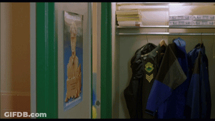 A Locker With A Poster On The Door That Says ' Military ' On It GIF