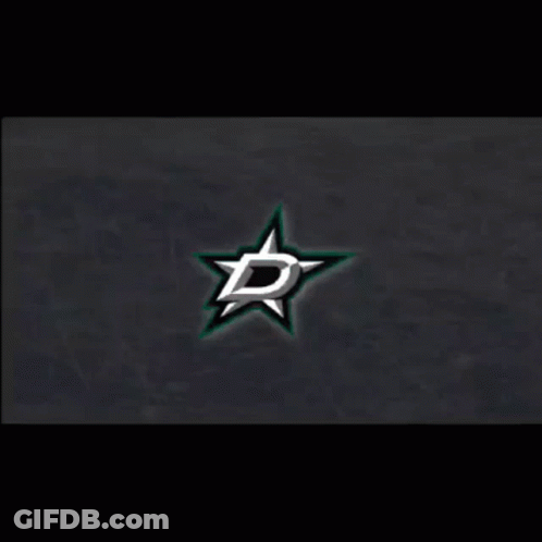 A Logo For The Dallas Stars With A Green And White Star On A Black Background GIF